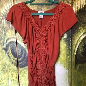 Woman’s side ruched short sleeve top